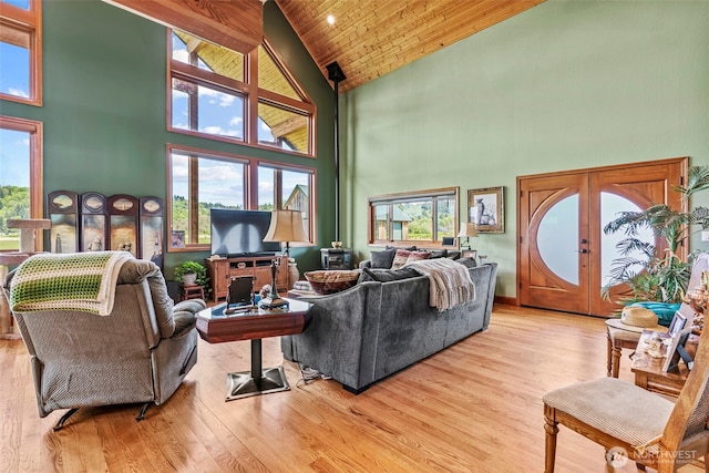 6238 Willow Grove Rd, Longview, WA 98632 - living room featuring high vaulted ceiling, wooden ceiling, plenty of natural light, wood finished floors, and french doors