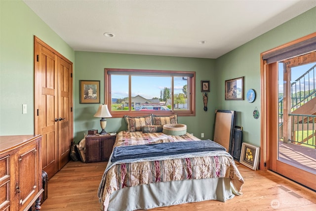 6238 Willow Grove Rd, Longview, WA 98632 - bedroom featuring light wood-style floors and access to outside