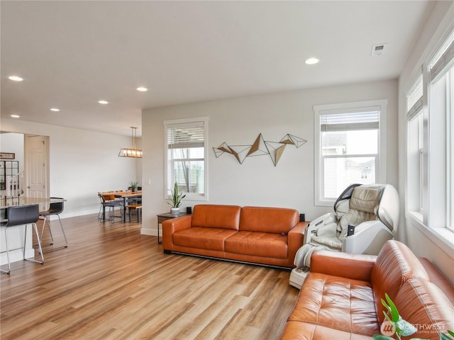 2668 83rd Avenue Ct E, Edgewood, WA 98371 - living area featuring light wood-style flooring, recessed lighting, and baseboards