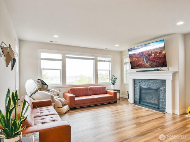 2668 83rd Avenue Ct E, Edgewood, WA 98371 - living room with light wood-style floors, a fireplace, and recessed lighting