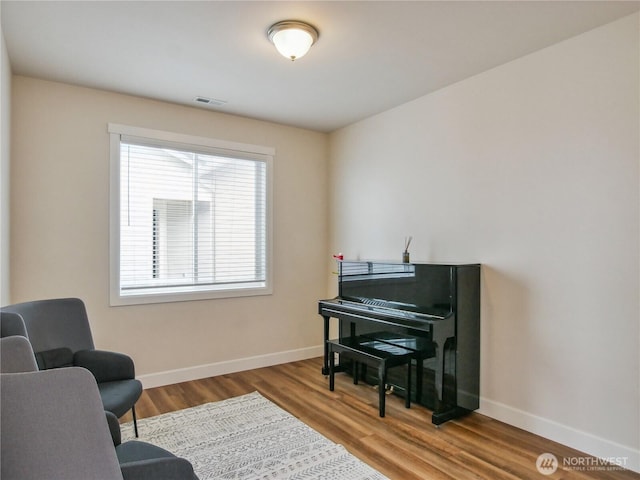 2668 83rd Avenue Ct E, Edgewood, WA 98371 - living area featuring baseboards and wood finished floors