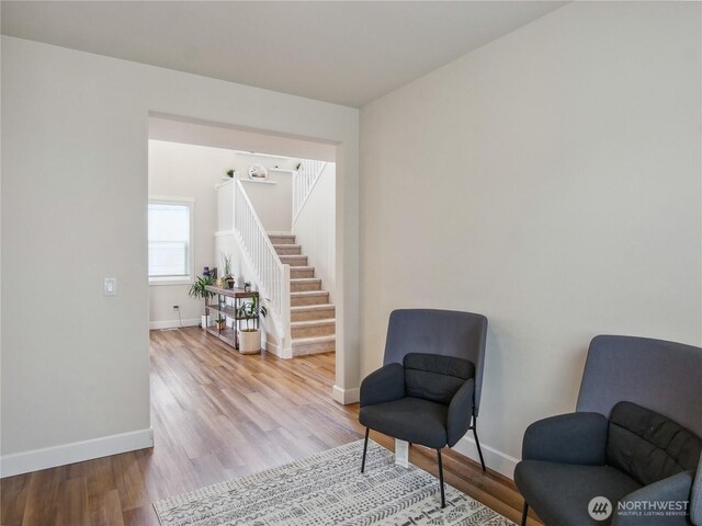 2668 83rd Avenue Ct E, Edgewood, WA 98371 - living area featuring stairway, wood finished floors, and baseboards