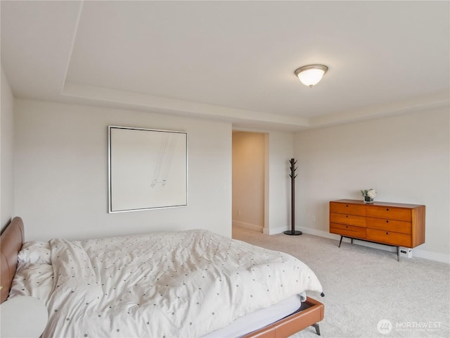2668 83rd Avenue Ct E, Edgewood, WA 98371 - bedroom featuring light colored carpet, baseboards, and a raised ceiling