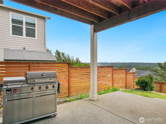 2668 83rd Avenue Ct E, Edgewood, WA 98371 - view of patio featuring a fenced backyard and grilling area
