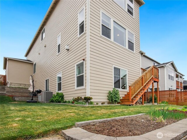 2668 83rd Avenue Ct E, Edgewood, WA 98371 - back of property with stairs and cooling unit