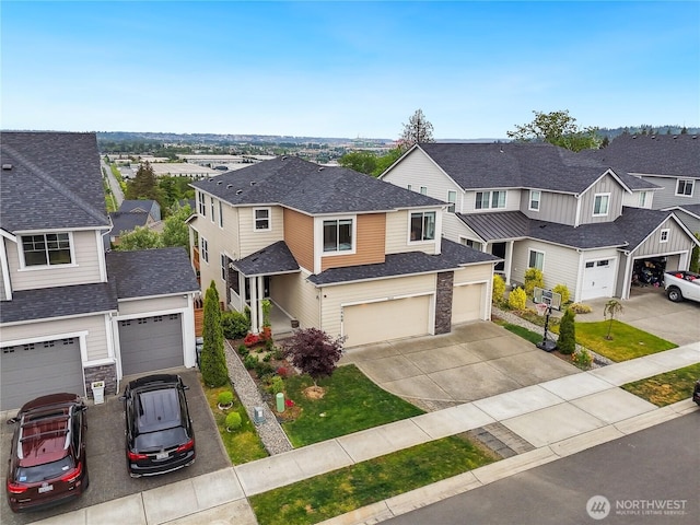 2668 83rd Avenue Ct E, Edgewood, WA 98371 - view of front facade featuring a residential view, driveway, stone siding, and a shingled roof