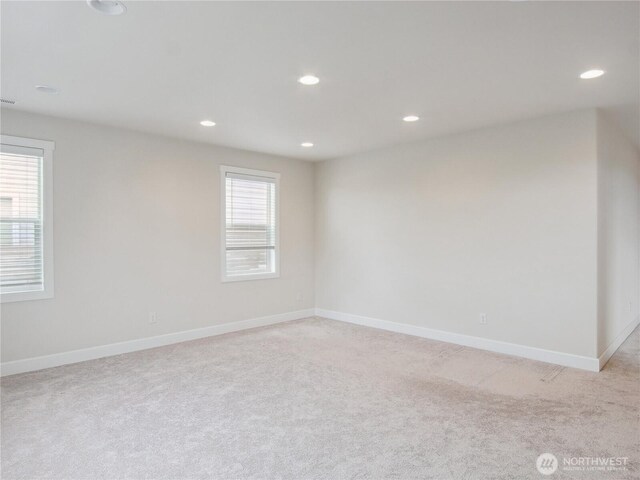 2668 83rd Avenue Ct E, Edgewood, WA 98371 - spare room with light colored carpet, recessed lighting, and baseboards