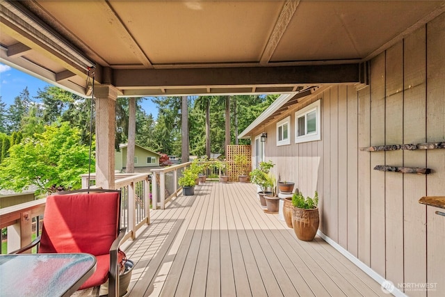 104 Point Fosdick Cir NW, Gig Harbor, WA 98335 - deck featuring view of scattered trees