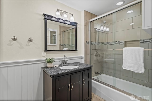 104 Point Fosdick Cir NW, Gig Harbor, WA 98335 - full bathroom featuring shower / bath combination with glass door, vanity, and wainscoting