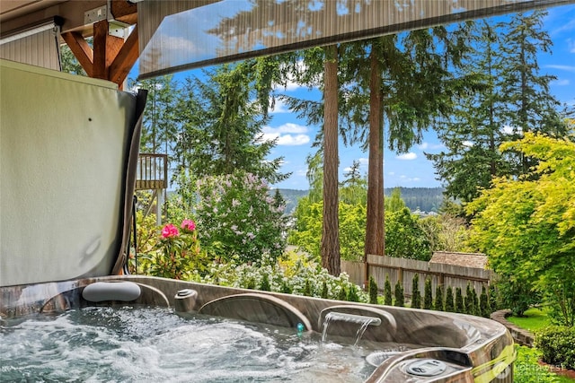 104 Point Fosdick Cir NW, Gig Harbor, WA 98335 - exterior space with fence and a jacuzzi