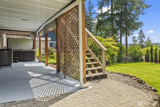 104 Point Fosdick Cir NW, Gig Harbor, WA 98335 - view of patio featuring stairway, a covered hot tub, and central AC
