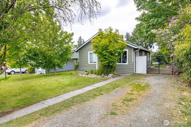 213 S 70th St, Tacoma, WA 98408 - view of front facade featuring a gate and dirt driveway