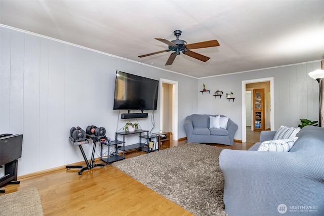 213 S 70th St, Tacoma, WA 98408 - living area with a ceiling fan, wood finished floors, and crown molding