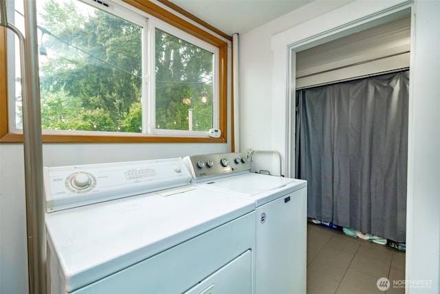 213 S 70th St, Tacoma, WA 98408 - washroom featuring independent washer and dryer and light tile patterned flooring