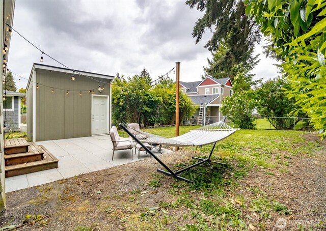 213 S 70th St, Tacoma, WA 98408 - view of yard with a patio