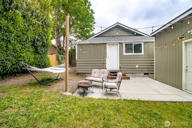 213 S 70th St, Tacoma, WA 98408 - rear view of property with a shingled roof, a patio area, a fire pit, and crawl space