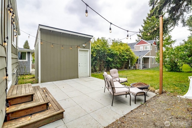 213 S 70th St, Tacoma, WA 98408 - view of patio with a fire pit