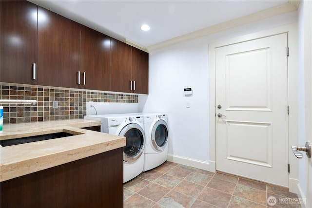 16915 SE 39th St, Bellevue, WA 98008 - laundry room with cabinet space, baseboards, separate washer and dryer, recessed lighting, and light stone finish floors