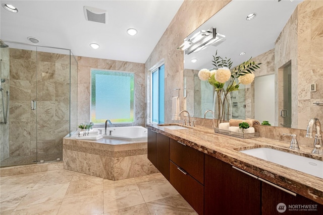 16915 SE 39th St, Bellevue, WA 98008 - full bath featuring tile walls, a bath, a stall shower, double vanity, and recessed lighting