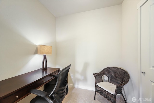 carpeted office with baseboards
