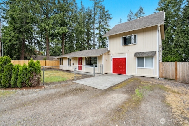 1115 207th Pl NE, Sammamish, WA 98074 - view of front of home featuring a shingled roof and dirt driveway