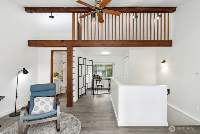 1115 207th Pl NE, Sammamish, WA 98074 - interior space featuring ceiling fan, a high ceiling, an upstairs landing, wood finished floors, and baseboards