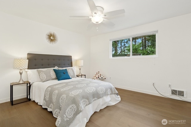 1115 207th Pl NE, Sammamish, WA 98074 - bedroom with wood finished floors, baseboards, and ceiling fan