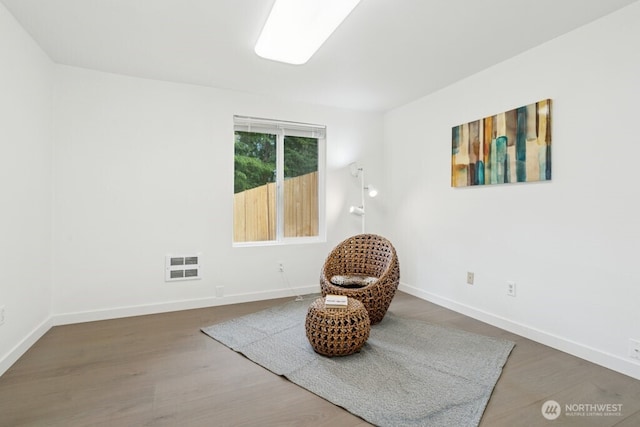 1115 207th Pl NE, Sammamish, WA 98074 - sitting room featuring wood finished floors and baseboards
