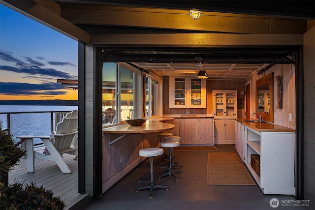 3316 SW 172nd St, Burien, WA 98166 - bar with a water view, finished concrete floors, and a sink