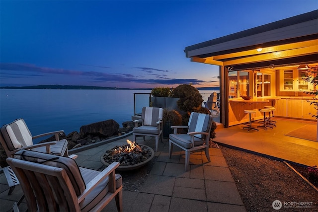 3316 SW 172nd St, Burien, WA 98166 - view of patio / terrace with a fire pit and a water view