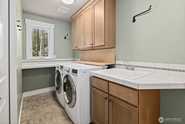 12331 3rd Ave NE, Marysville, WA 98271 - laundry room with cabinet space and washer and dryer