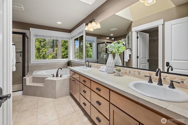 12331 3rd Ave NE, Marysville, WA 98271 - full bathroom featuring a stall shower, a garden tub, tile patterned floors, double vanity, and a spacious closet