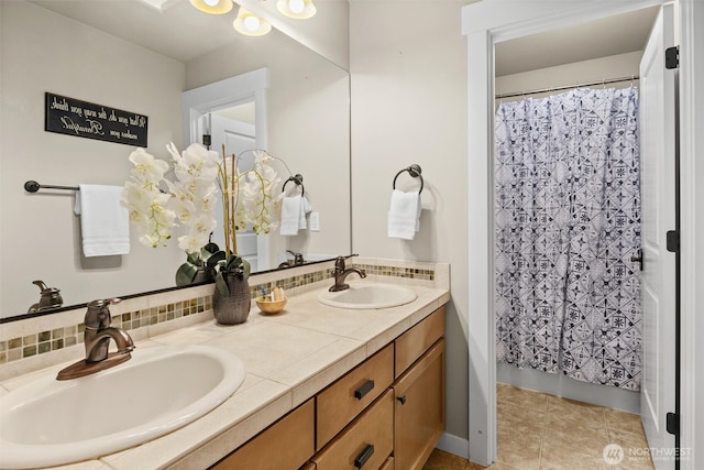 12331 3rd Ave NE, Marysville, WA 98271 - bathroom with double vanity, a shower with curtain, and tile patterned floors