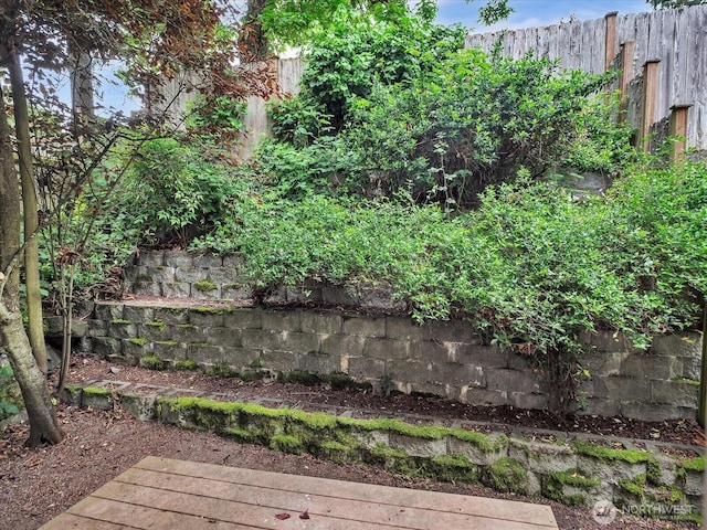 view of yard featuring fence