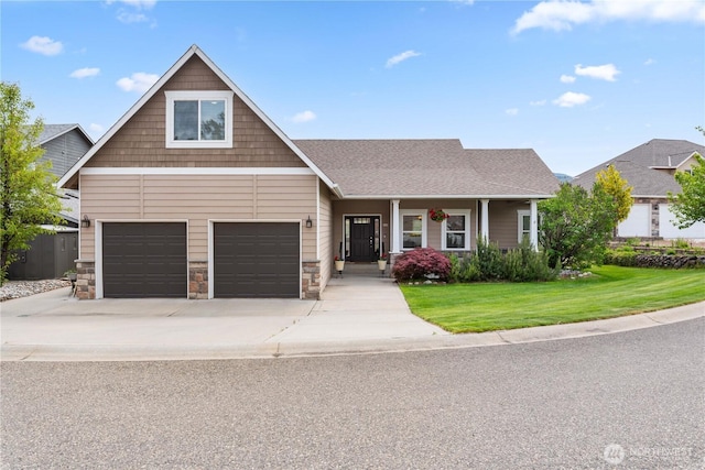 2835 Aspen Shores Dr, East Wenatchee, WA 98802 - craftsman-style house with a front yard, driveway, a garage, a porch, and stone siding