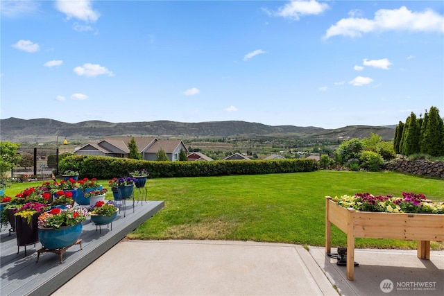 2835 Aspen Shores Dr, East Wenatchee, WA 98802 - view of green lawn featuring a mountain view and a patio area