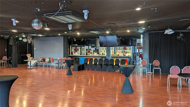 2040 Westlake Ave N Unit 17, Seattle, WA 98109 - game room with wood finished floors and a bar