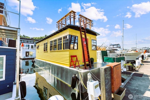 2040 Westlake Ave N Unit 17, Seattle, WA 98109 - view of front of house featuring a boat dock