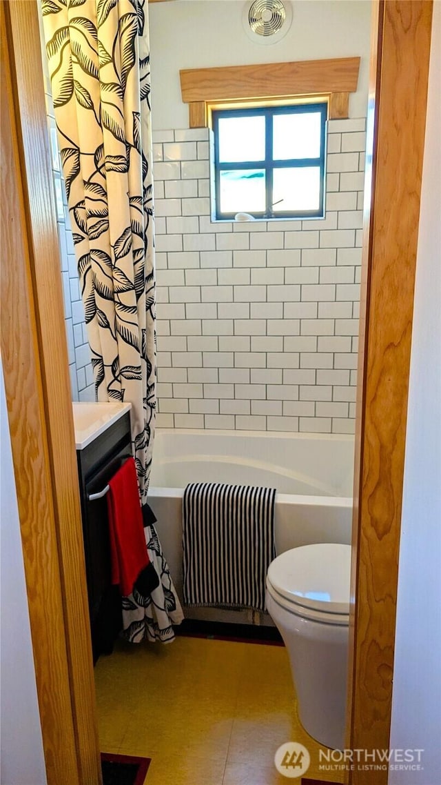 2040 Westlake Ave N Unit 17, Seattle, WA 98109 - bathroom with radiator, shower / bath combo, and vanity