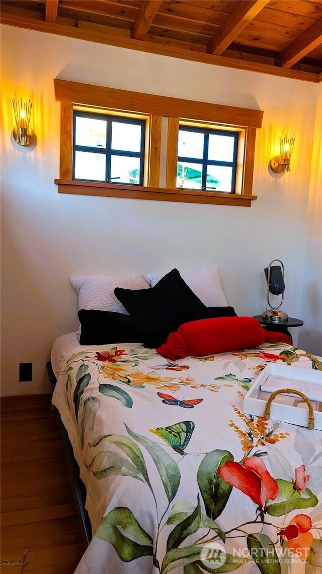 2040 Westlake Ave N Unit 17, Seattle, WA 98109 - bedroom featuring a wood ceiling with exposed beams and wood finished floors