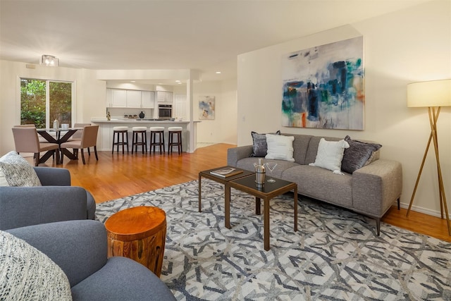 living room with light wood-style floors