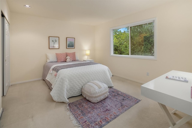 carpeted bedroom with baseboards and recessed lighting