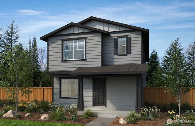 5206 87th Dr NE Unit 059, Marysville, WA 98270 - view of front of home with fence, a shingled roof, and board and batten siding