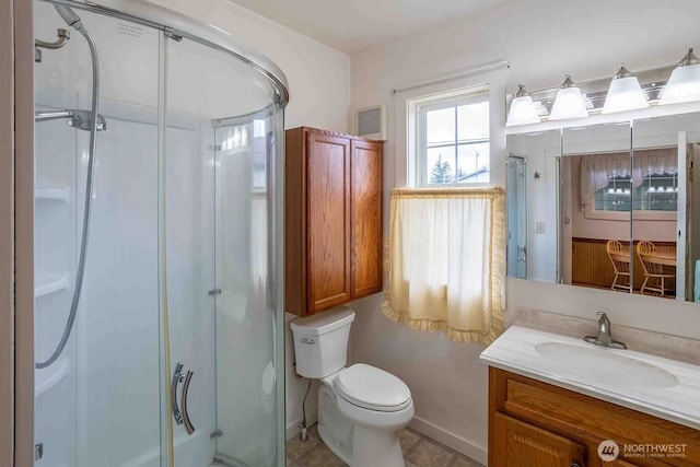 116 E 4th St, Centralia, WA 98531 - bathroom with a stall shower, toilet, and vanity