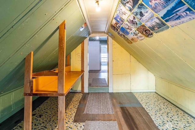 116 E 4th St, Centralia, WA 98531 - additional living space featuring vaulted ceiling and wood finished floors