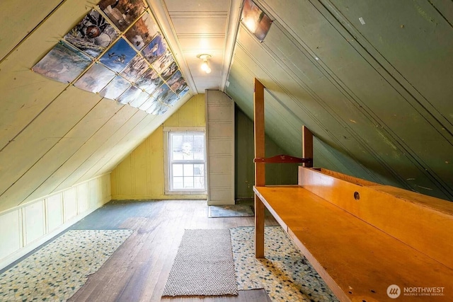 116 E 4th St, Centralia, WA 98531 - additional living space with lofted ceiling and wood-type flooring