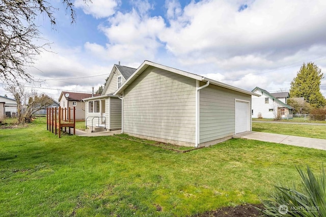 116 E 4th St, Centralia, WA 98531 - view of home's exterior with driveway and a lawn