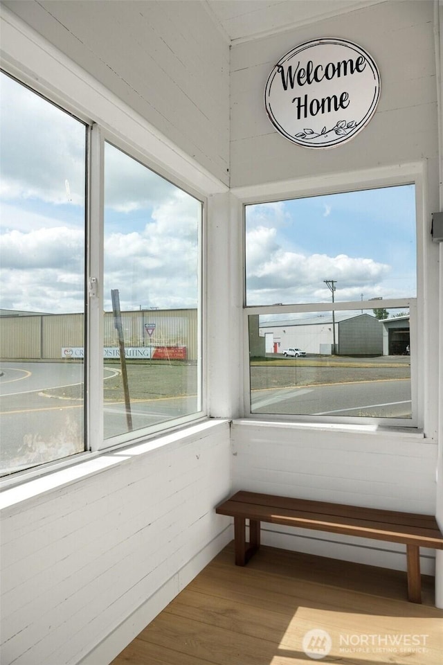 1118 W Wishkah St, Aberdeen, WA 98520 - sunroom featuring healthy amount of natural light, wood finished floors, and a baseboard heating unit