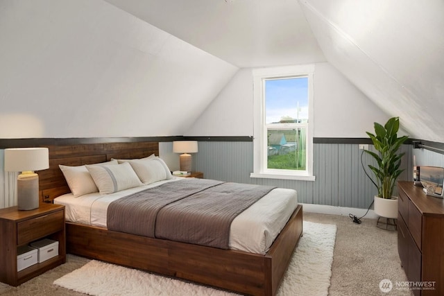 1118 W Wishkah St, Aberdeen, WA 98520 - bedroom with carpet flooring, lofted ceiling, a wainscoted wall, and wood walls