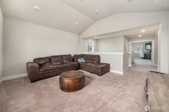 18410 20th Avenue Ct E, Spanaway, WA 98387 - living room with light carpet, lofted ceiling, and baseboards